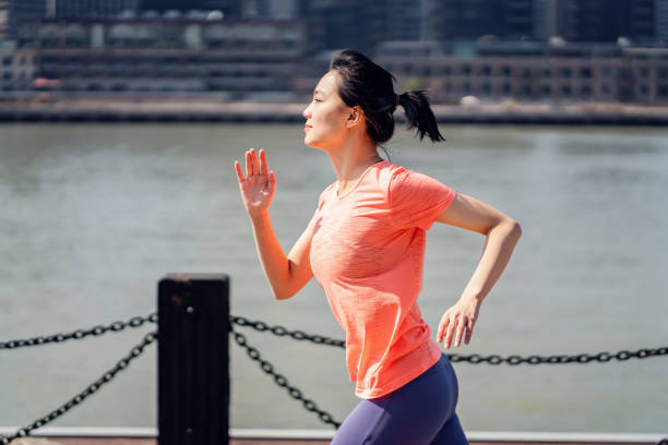 istock Female running in the city 1311479734