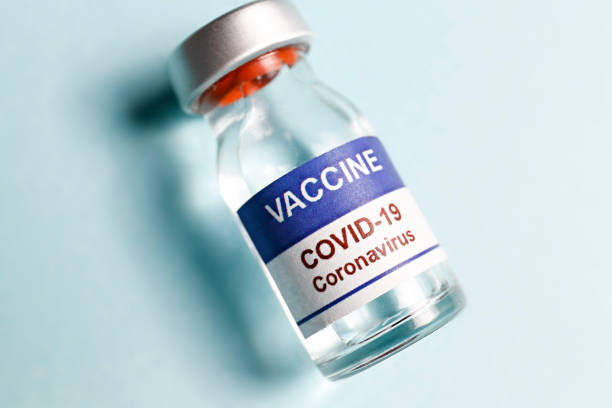 istock Bottle with anti viral vaccine. 1311480582