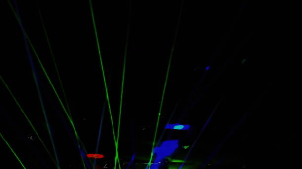 istock Laser neon music light rays flash and glow in the banquet hall 1311480622