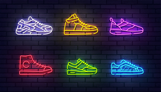 Shoes neon sign isolated, bright signboard. Sneakers set icon neon, emblem. Vector illustration