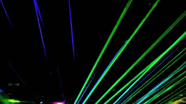 istock Laser neon music light rays flash and glow in the banquet hall 1311483596