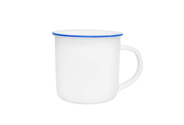istock White vintage mug isolated on white background. Retro style steel cup, mock-up. 1311484749