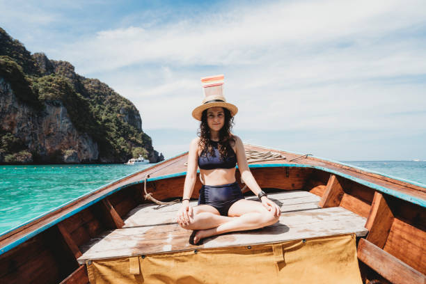 istock Young woman on a longtail boat in Thailand, Phi Phi Island 1311496591