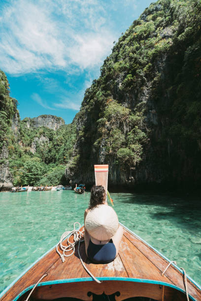istock Young woman on a longtail boat in Thailand, Phi Phi Island 1311496618