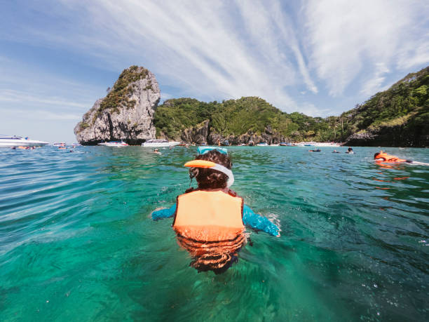 istock Swimming in Phi Phi Island's sea - Thailand 1311496640