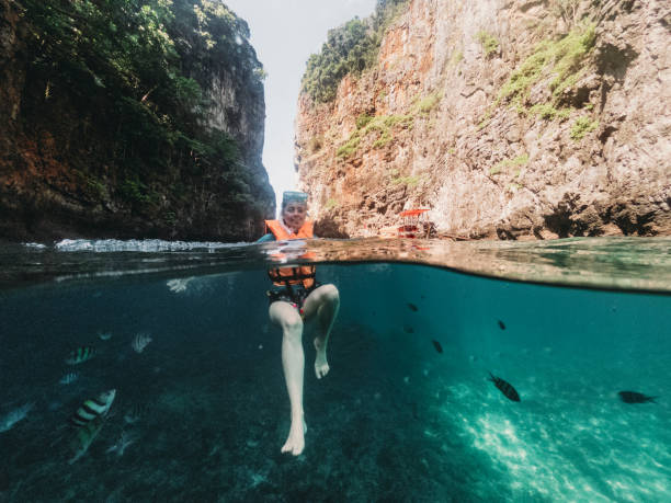 istock Swimming in Phi Phi Island's sea - Thailand 1311496644