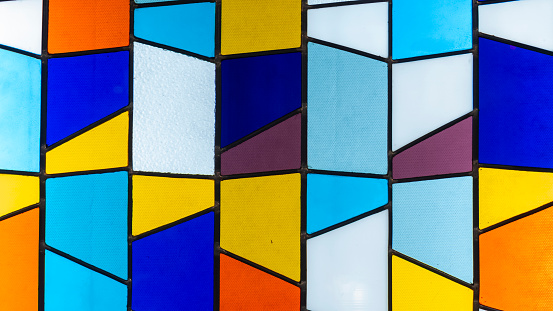 Colorful stained glass background abstract. Medieval Random Pieces of Glass.