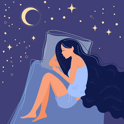 Young woman sleeps on side. A sleeping girl flies in a dream among the stars. Sweet dreams, good health concept.