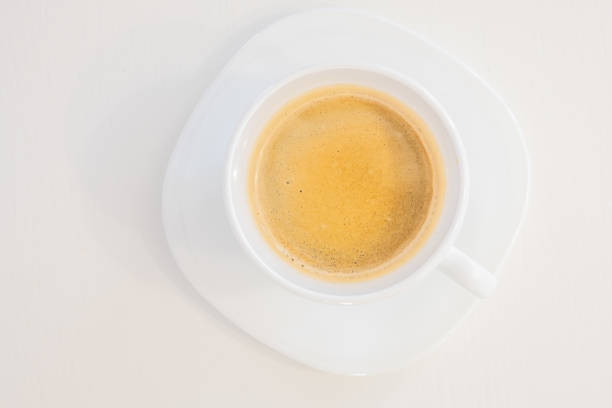 istock Close up top view of a white coffee cup isolated on white background 1311503184