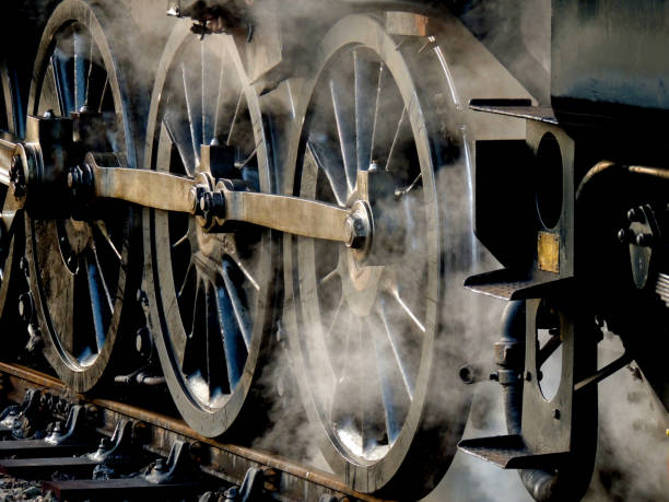 istock Steam Train wheels on the track 1311503199