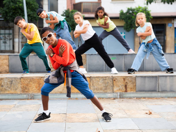 istock Boy hip hop dancer exercising outdoors 1311509132