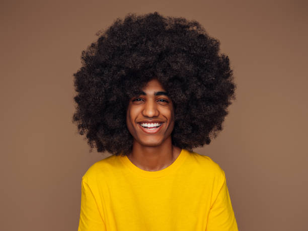 istock Portrait of funny afro guy 1311510273