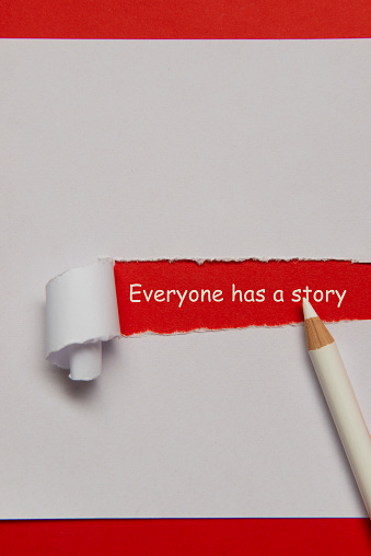 Everyone has a story typed on torn paper.