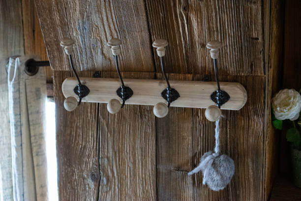 istock Coat rack in a wooden cottage. 1311511037