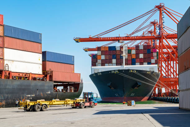 istock Mooring man near container ship leaving from the port. 1311511449
