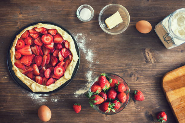 istock Preparing strawberry galette or open strawberry pie 1311513845
