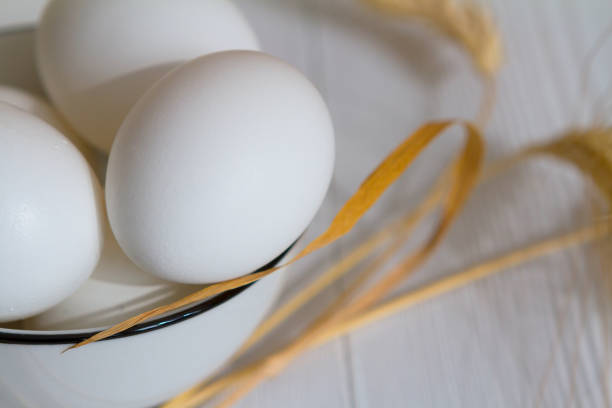 istock White eggs in a bowl on a wooden table 1311514157