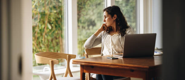 istock Woman taking a break from work at home 1311514185