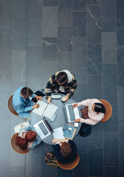 istock Young people studying in college campus 1311514986