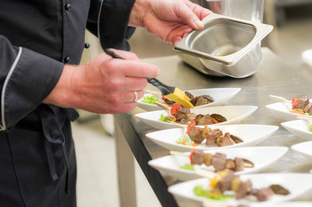 istock Catering buffet prepared cook for an event with small dishes 1311516415