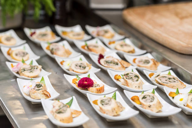 istock Catering buffet prepared cook for an event with small dishes 1311516483