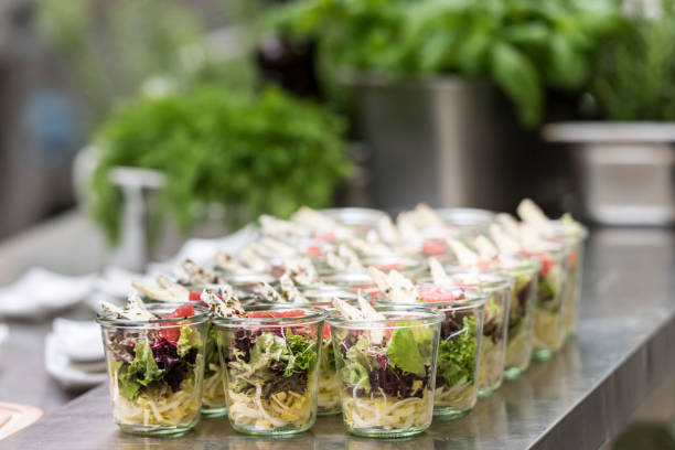 istock Catering buffet prepared cook for an event with small dishes 1311516631