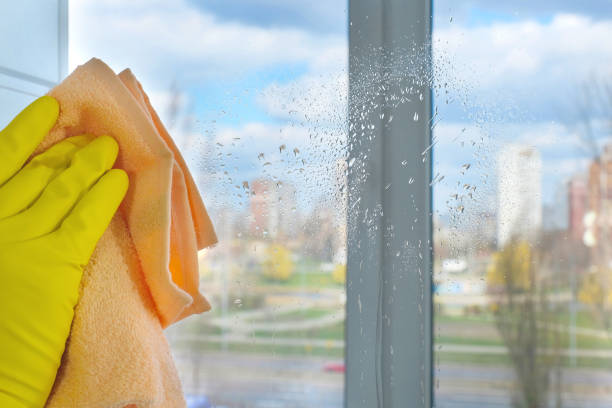 istock Window cleaning with a rag close-up. Cleaning concept. 1311519286