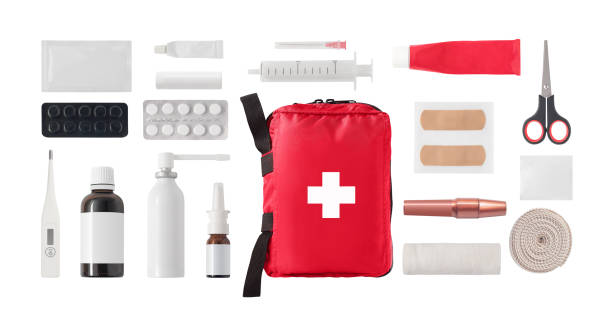 First aid kit Flat lay of medical first aid kit with medicine, drugs and bandages isolated on white background bandage stock pictures, royalty-free photos & images