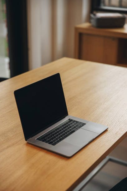 istock Laptop with black screen in business meeting room 1311521069