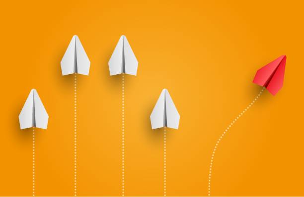 istock Individuality concept. Individual and unique leader red paper plane flies to the side. Vector 1311522056