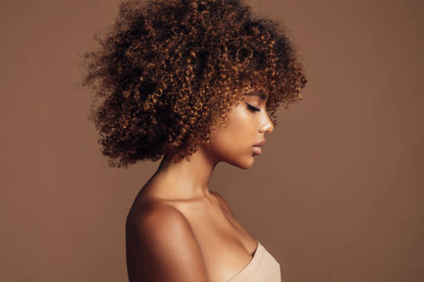 istock Beautiful girl with curly hairstyle 1311525482
