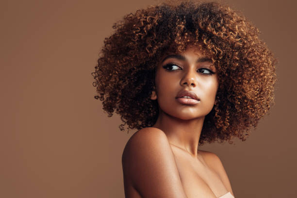 istock Beautiful girl with curly hairstyle 1311525596