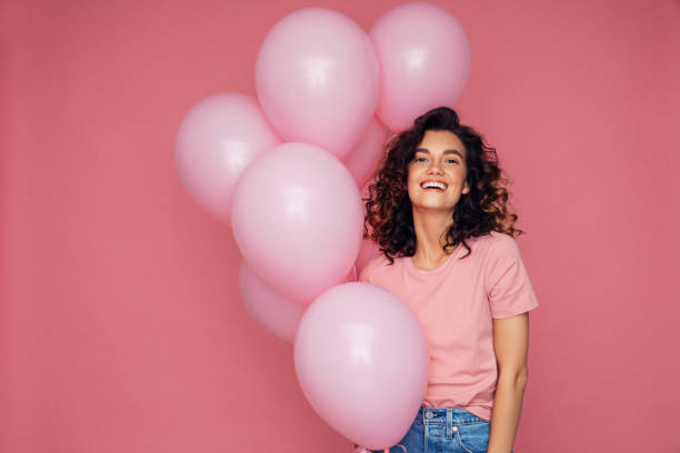 Woman with air balloons