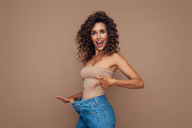 Young woman losing weight