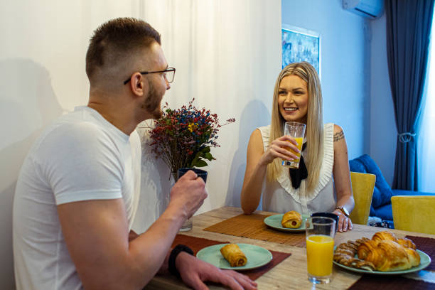 istock A young couple has breakfast at home 1311535948