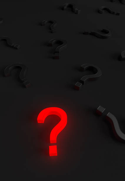 istock A lot of question mark on a dark background 1311539389
