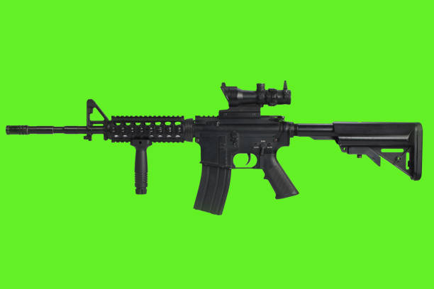 istock AR15 assault rifle with optic sight and a foregrip on green background 1311540362