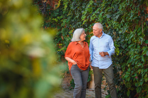 istock Spanish Senior Couple Enjoying Walk and Conversation 1311546294