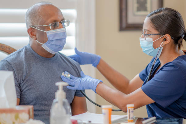 istock Female doctor on a house call 1311551648