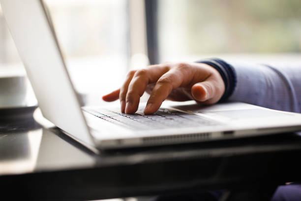 istock Working on a laptop at home 1311552558