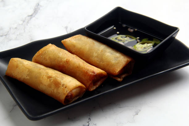 istock Freshly cooked Filipino food called Lumpiang Shanghai 1311558761