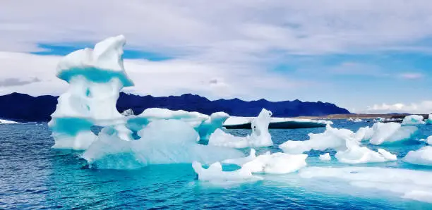 Photo of Glacier Lagoon, Iceland: Lagoon, Icebergs, Mountains, Turquoise Sky