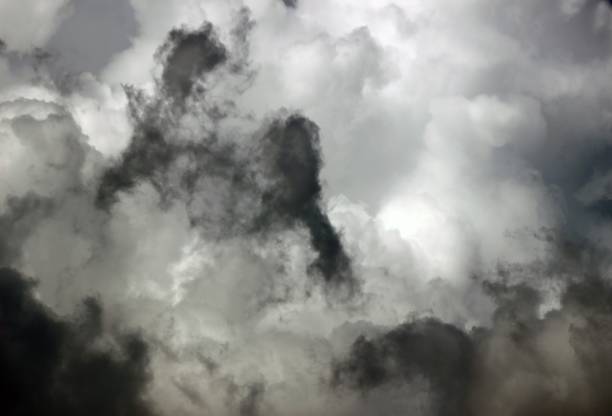 istock Weather backdrop of dark storm clouds gathering 1311564624