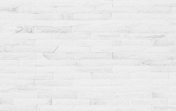istock White grunge brick wall texture background for stone tile block painted in grey light color wallpaper modern interior and exterior and room backdrop design 1311566723