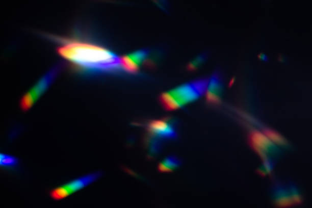 istock colorful warm rainbow crystal light leaks on black background 1311579473