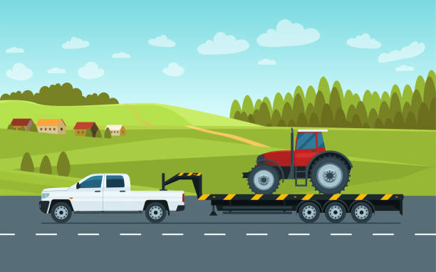 트레일러가 달린 픽업 트럭이 시골 풍경을 배경으로 도로에서 트랙터를 수송합니다. 벡터 플랫 스타일 일러스트레이션. - vehicle trailer stock illustrations
