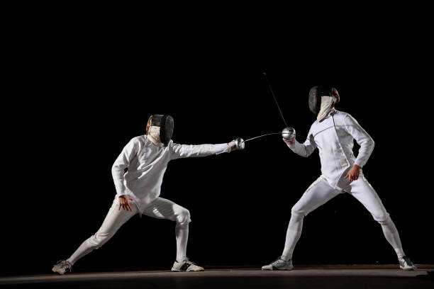 batalla de fancing - esgrima fotografías e imágenes de stock