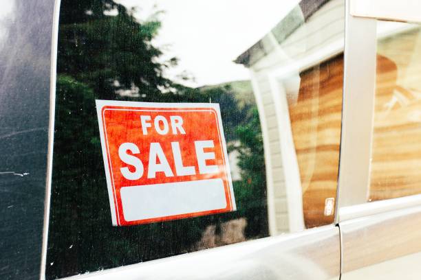 istock Car with For Sale Sign 1311584081