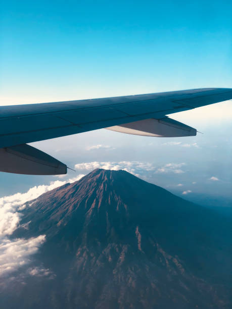 istock View through a passenger airplane window on a beautiful landscape. 1311590105