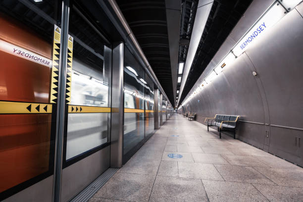 istock Futuristic architecture in deserted London underground station 1311591238